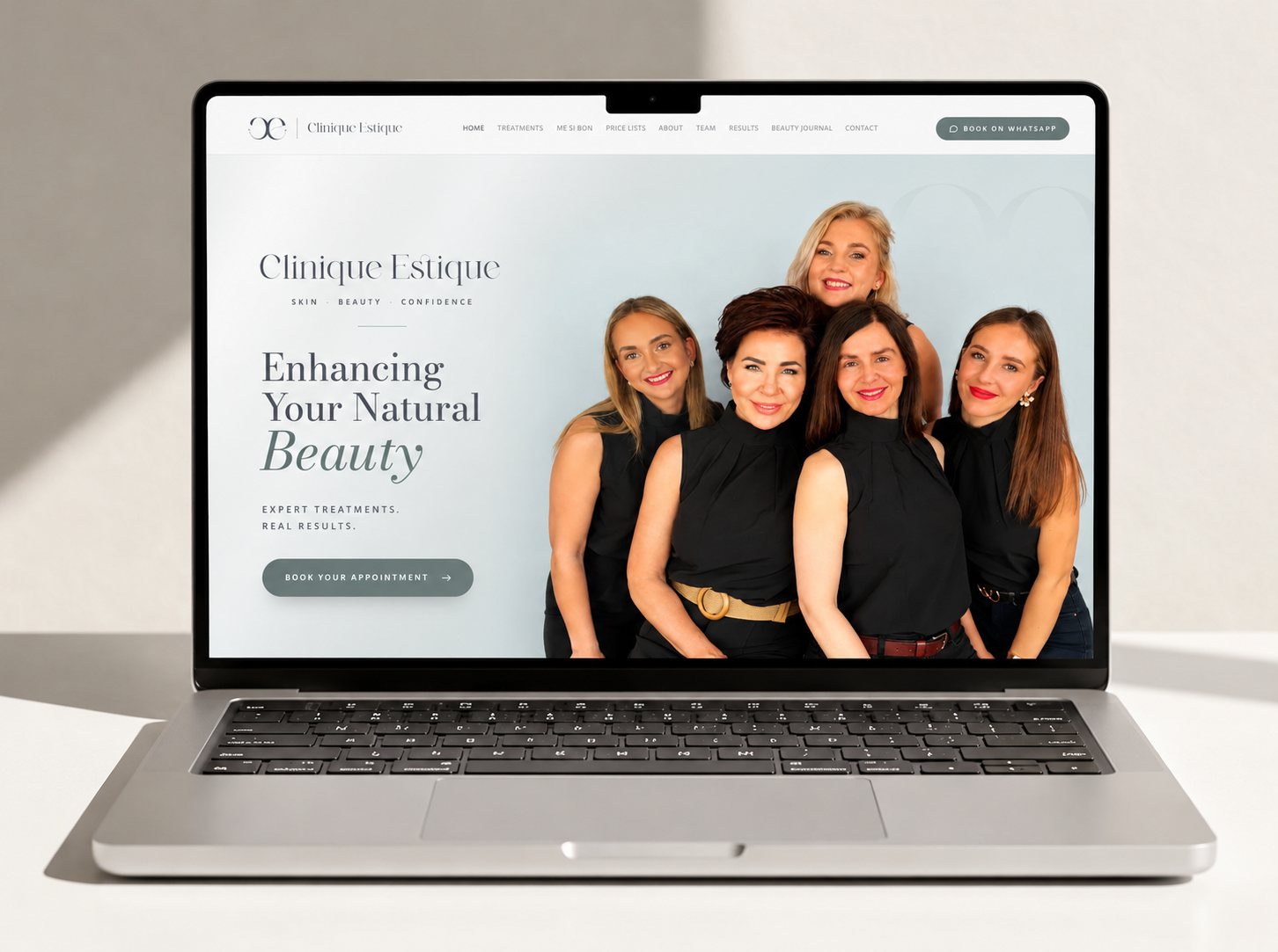 Clinique Estique website shown on a laptop